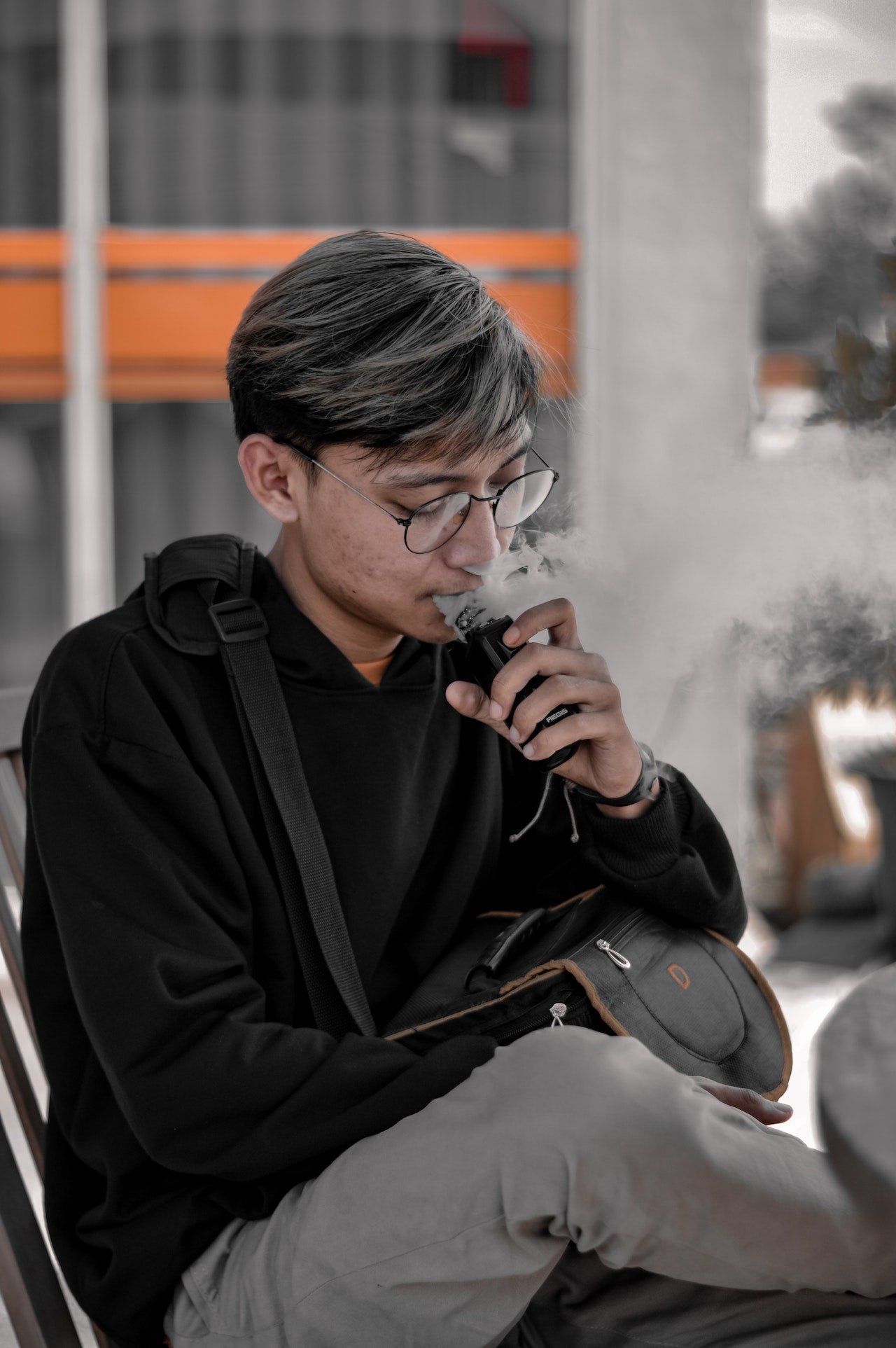 young boy vaping