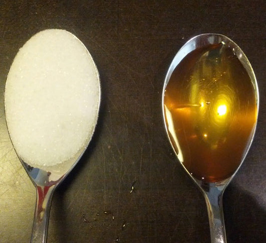 Tre anledningar till att ersätta socker i din kost med rå honung kan förhindra överskott av kroppsfett