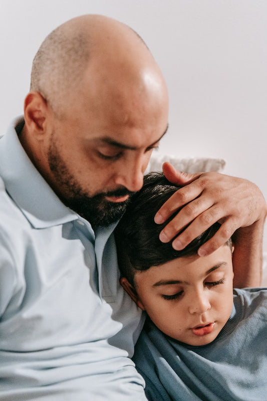 balding father with son