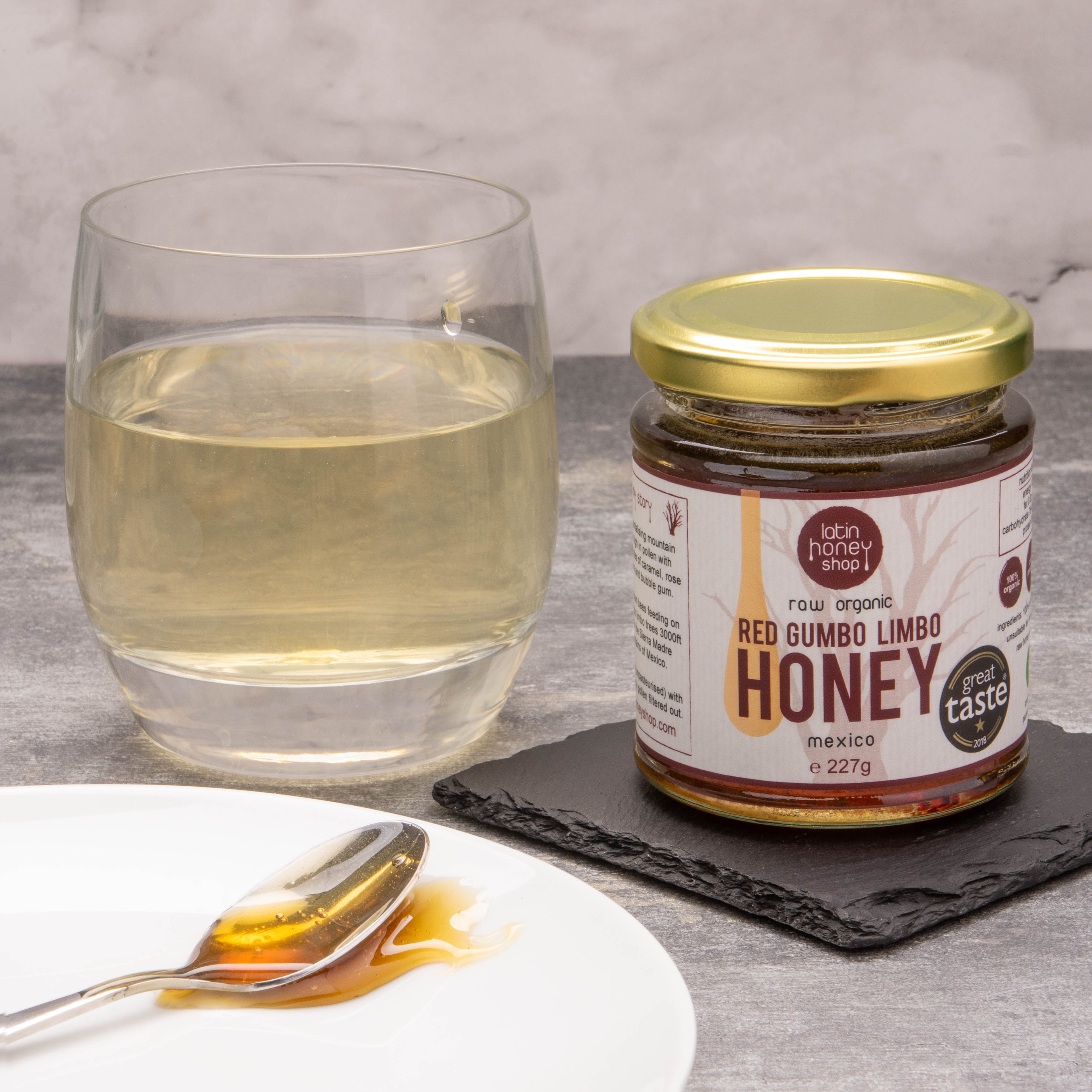 rå ekologisk röd gumbo limbo hösnuva honung från mexiko